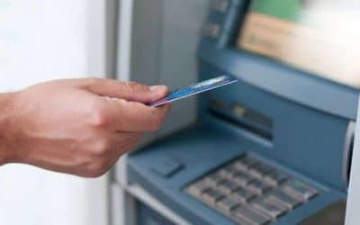 hand-inserting-atm-card-into-bank-machine-withdraw-money-businessman-men-hand-puts-credit-card-into-atm-1